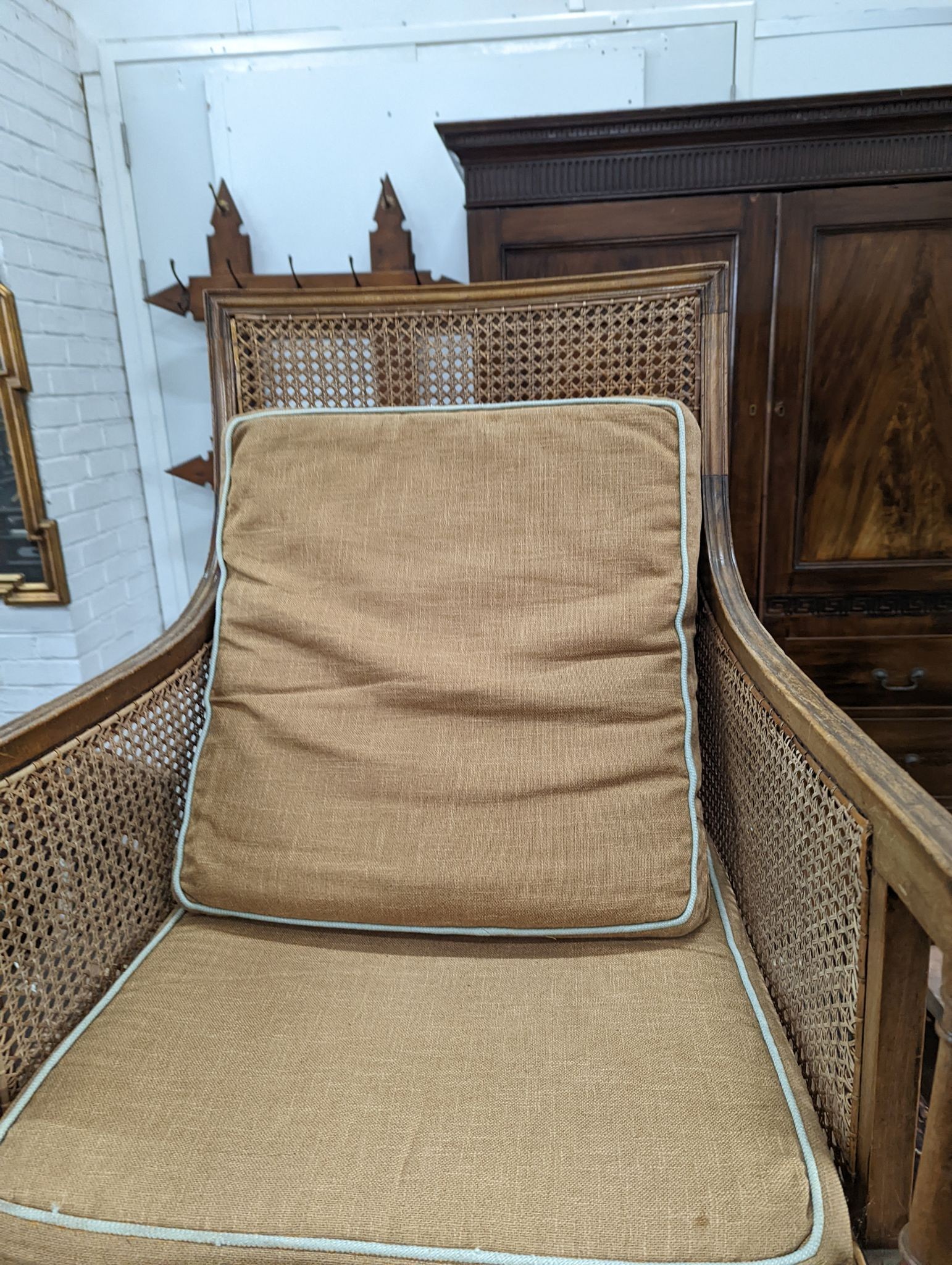 A Regency style mahogany bergere armchair, width 59cm, depth 56cm, height 97cm